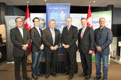 Funding for Regional Tech Leaders Announced: (Left to right) Brian Cram, CEO, Dejero Labs; Joseph Fung, Co-Founder and CEO, TribeHR Corporation; Peter Mabson, President, exactEarth Ltd.; Stephen Woodworth, Member of Parliament for Kitchener Centre; Peter Braid, Member of Parliament for Kitchener-Waterloo; Iain Klugman, President and CEO, Communitech.