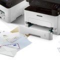 The printer handles a wide range of paper, from thin tracing paper to thicker card stock