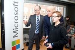 Tobin Haas, SickKids patient ambassador, tests the new Xbox One with Michael Hilliard (Senior Corporate Counsel , Microsoft Canada) and John Hartman (Chief Operating Officer, Children's Miracle Network) at The Hospital for Sick Children (SickKids). It's part of a major technology donation to the hospital.
