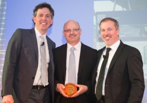 Panasonic Eco Solutions Canada Managing Director Walter Buzzelli (centre) receives Canadian Solar Industries Association Game Changer Award for Energy Management and is flanked by Gala event Co-hosts Gregory Scallen, past CanSIA Board Chair and John Gorman, President & CEO of CanSIA