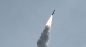 Picture shows rocket launching wiht plume of smale trailing behind. Cheaper Telecom Service from Cellphone Towers in Space
