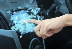 Human finger points to touchscreen on car dashboard. Want to Get Paid $33 Billion a Year? Maybe 600 Billion If Your Data Is Good 