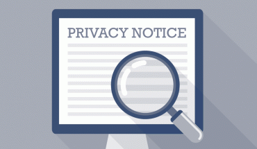 magnifying glass over privacy notice on computer screen