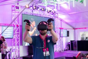A video gamer wears VR headset
