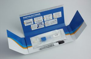 a genetic testing kit with swabs and marker pen