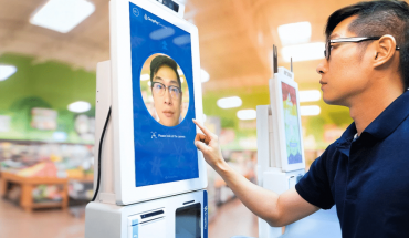 man using face recognition screen