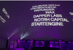 company names projected on giant screen