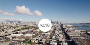 Xero corporate logo superimposed on aerial city scene