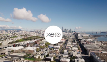 Xero corporate logo superimposed on aerial city scene