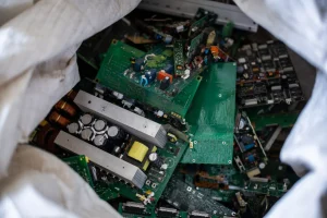 a pile of e-waste components and materials