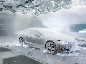 car in test chamber coated with ice and snow