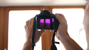 looking at a camera viewfinder held up to window