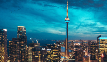 Toronto skyline at night, buildings with brightly-lit windows