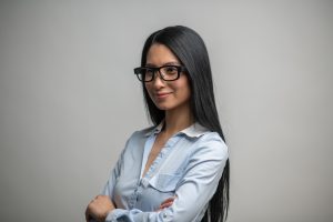 woman wearing Mindlink eye tracking glassses