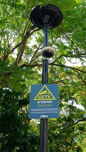 CCTC camera and signage on pole in park