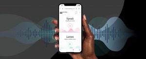 hand holds smartphone with language app