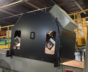 large spectral imaging housing sits over conveyor belt